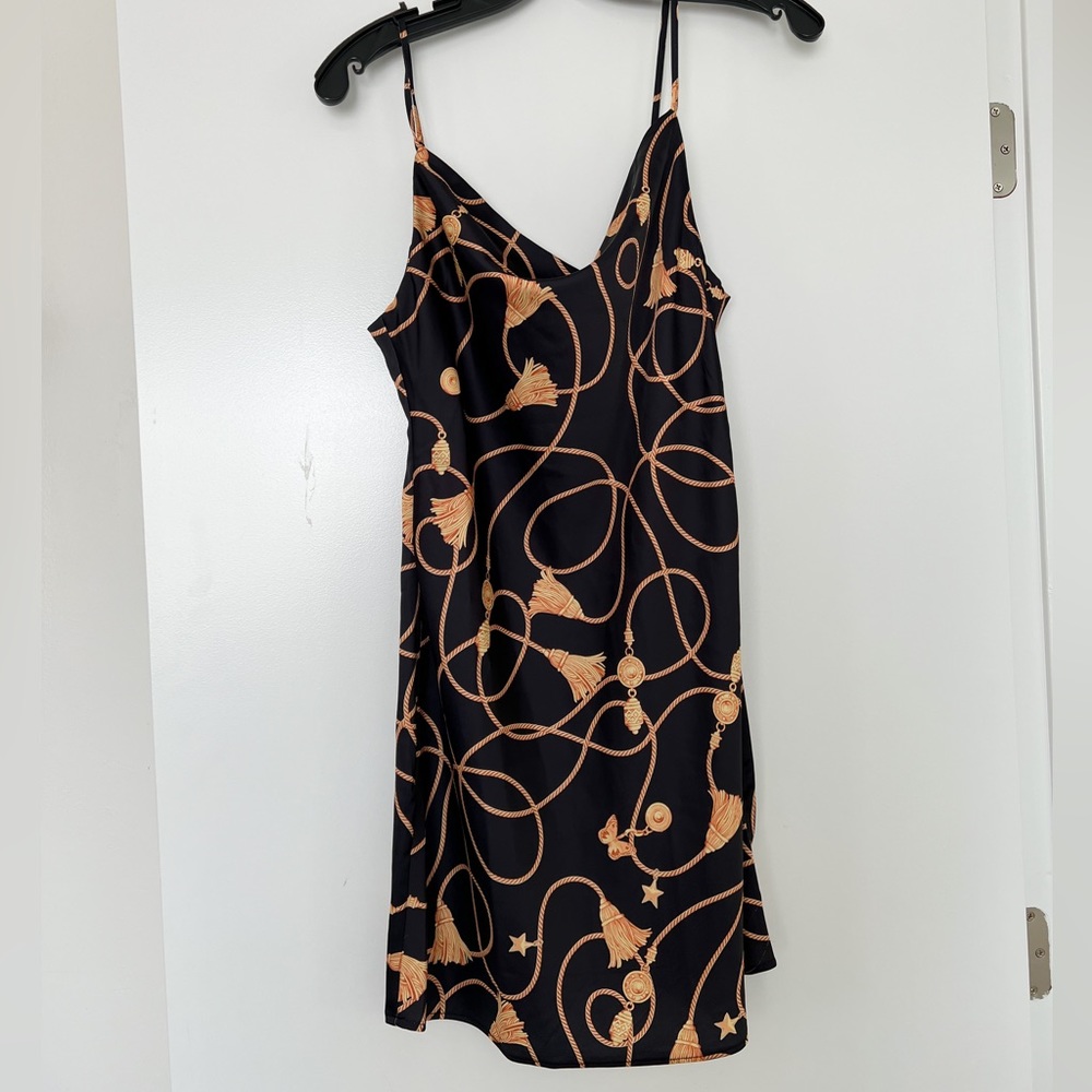 NEW WITH TAGS UNWORN. Urban outfitters satin black mini dress in S